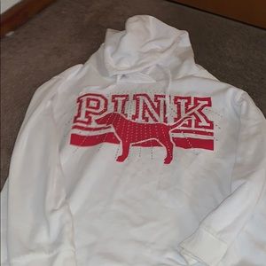 a white and red with dimonds hoodie